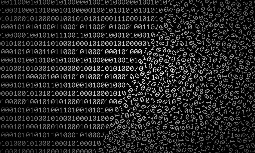 Artificial Intelligence and the Bad Data Problem - Binary Code turning into a jumble of numbers